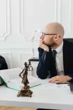 Photo by Karolina Grabowska: https://www.pexels.com/.../temida-on-the-man-s-desk-7876202/
